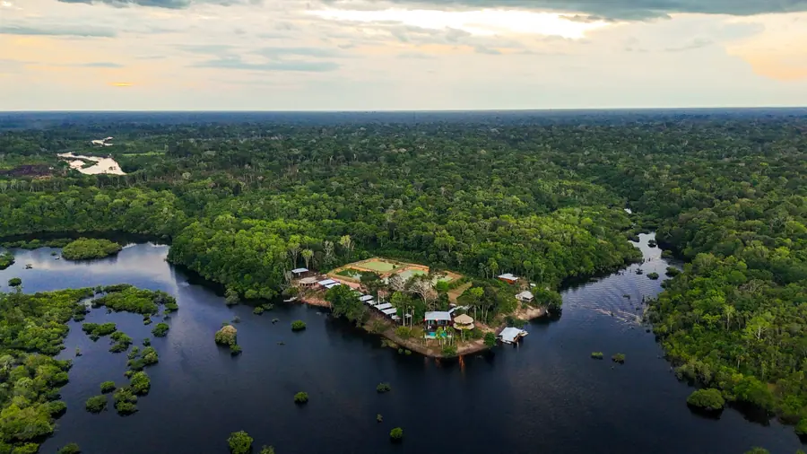 Aerial view of a lodge on an island in the river