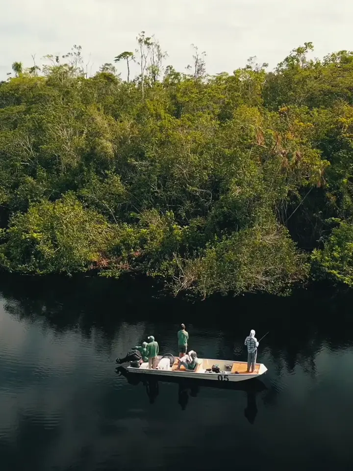 Anglers fishing a quiet lagoon on the Rio Negro